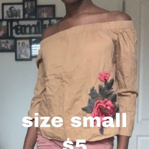 tan, green, and red floral off-shoulder top